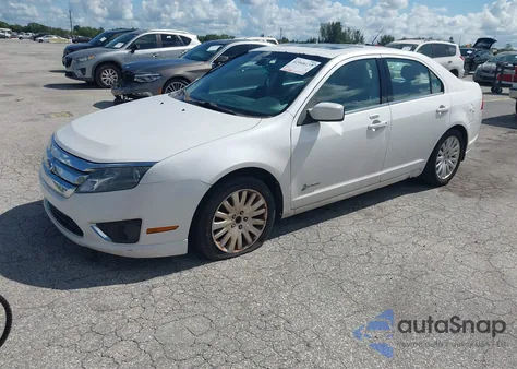 2011 Ford Fusion Hybrid from USA, damaged, VIN 3FADP0L34BR254595